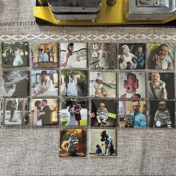 Custom photo magnets laying on a table